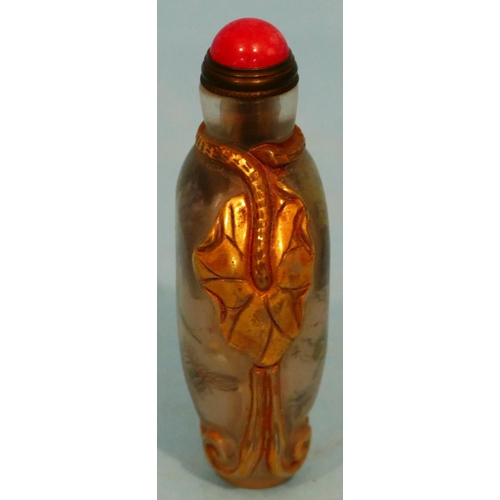 51 - An Oriental Peking Style Glass Snuff Bottle having inner painted insect decoration with stopper, 8cm... 