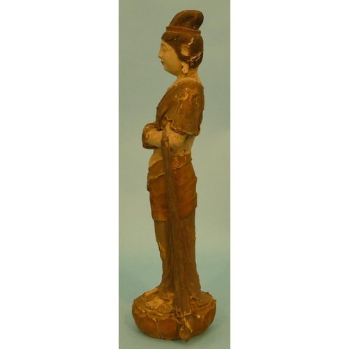 603 - A Carved Oriental Figure of a standing lady on lotus leaf, 36cm high.