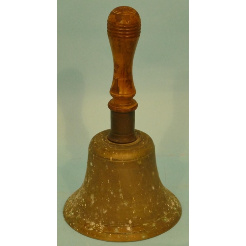 606 - A School Hand Bell having turned walnut handle, 28cm high.