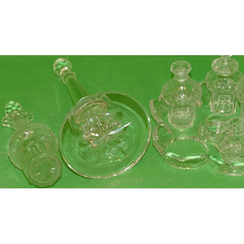 100 - A Dutch Cut Glass 5 Sectioned Condiment Stand having centre carrying handle mounted with 5 cut glass... 