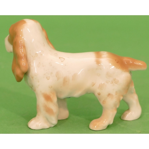 110 - A Royal Copenhagen Figure of a cocker spaniel 450, 8.5cm high.