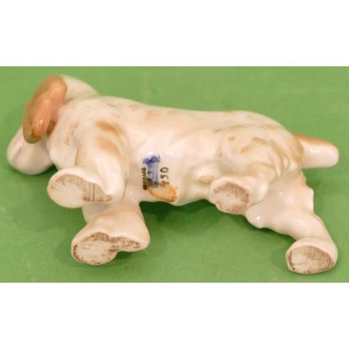 110 - A Royal Copenhagen Figure of a cocker spaniel 450, 8.5cm high.