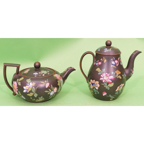 122 - 2 x Wedgwood Basalt Round Bulbous Shaped Teapots on black ground with multicoloured enamelled floral... 