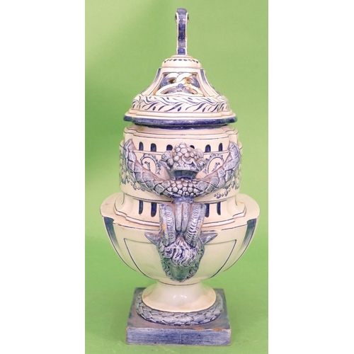 128 - G G & Co, Gin Glazed Majolica Oval Lidded Censer on blue and white ground with raised rams head, swa... 