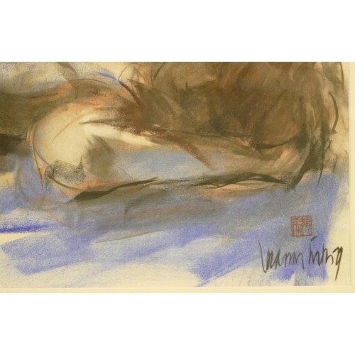 204 - A Charcoal and Watercolour Sketch of a sleeping female nude indistinctly signed, in silvered frame, ... 