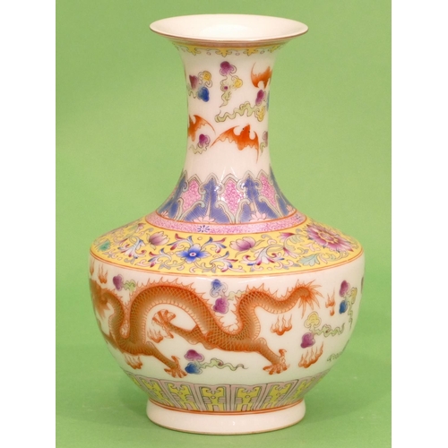 21 - An Oriental Round Bulbous Thin Necked trumpet Shaped Vase on white and yellow ground having multicol... 