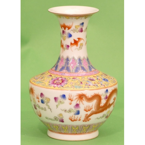 21 - An Oriental Round Bulbous Thin Necked trumpet Shaped Vase on white and yellow ground having multicol... 