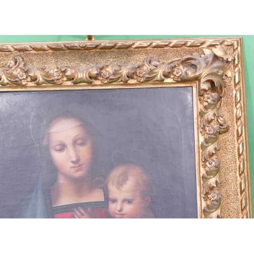 213 - A 19th Century Oil on Canvas after Raphael depicting Madonna and child, unsigned, in carved gilt woo... 