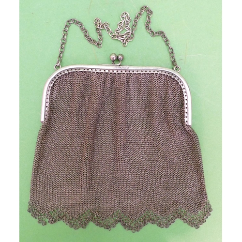 235 - A 925 Silver Ladies Mesh Evening Purse with chain, makers mark HS, 13.2cm wide, 162.6g.