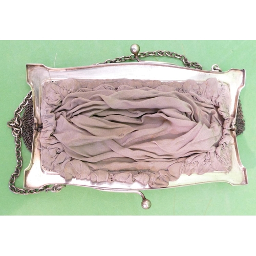 239 - A George V Silver Ladies Mesh Evening Purse with chain, having inner silk interior, London 1921, mak... 