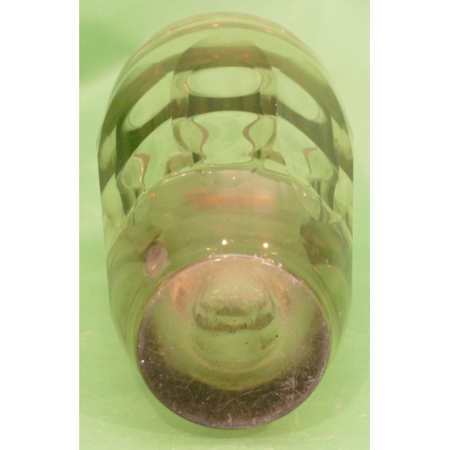 24 - A Heavy Smoked Glass Round Bulbous Shaped Vase having chamfer decoration, 25cm high.