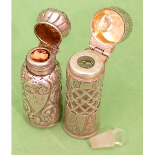 241 - An Edward VII Silver Cylindrical Scent Bottle having pierced decoration, glass liner, hinge lid with... 