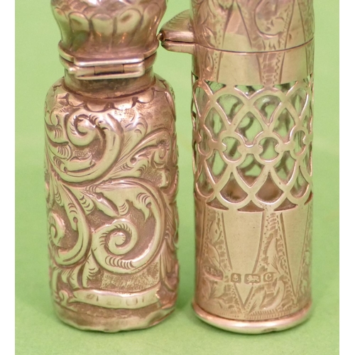 241 - An Edward VII Silver Cylindrical Scent Bottle having pierced decoration, glass liner, hinge lid with... 