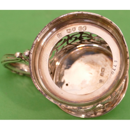 254 - A Victorian Silver Round Mustard Pot having hinge lid, scroll handle and pierced decoration, London ... 