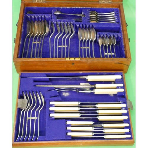 277 - A Haymarket Silver Plated Flatware Service in fitted oak canteen (2 carving implements missing).