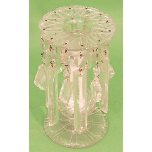 3 - A Heavy Cut Glass Lustre Candlestick having various cut glass drops, bulbous stem on round base, 20.... 