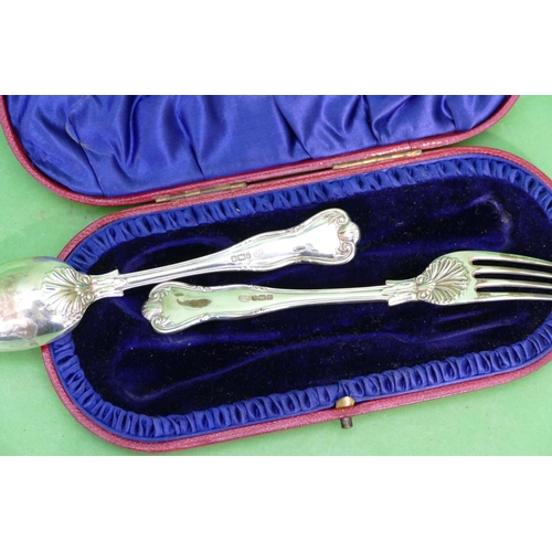 331 - A Late Victorian Child's Christening Set comprising fork and spoon with shell motifs in fitted red l... 