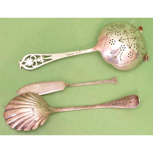 339 - A Sheffield Silver Tea Strainer having pierced handle, a Victorian silver jam spoon having shell sha... 