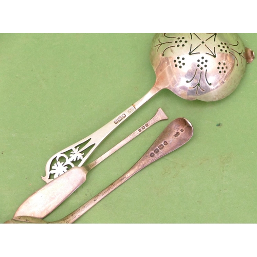 339 - A Sheffield Silver Tea Strainer having pierced handle, a Victorian silver jam spoon having shell sha... 