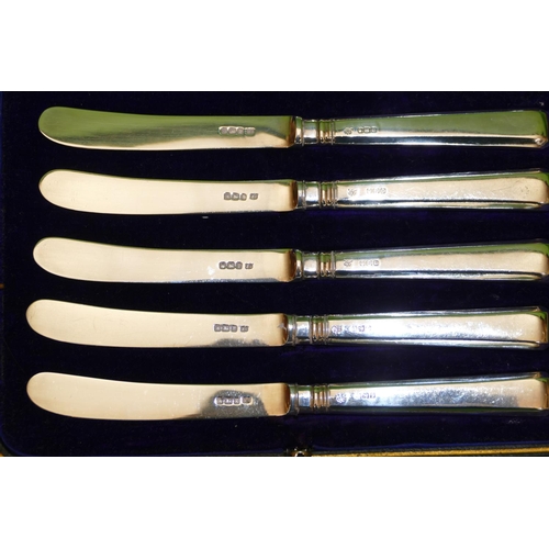 353 - A Set of 6 George V Silver Butter Knives having weighted handles, Sheffield 1916, makers mark JS, in... 