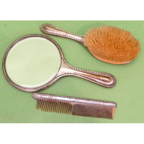 354 - A Birmingham Silver 3 Piece Dressing Table Set having key pattern rim, comprising hand mirror, brush... 