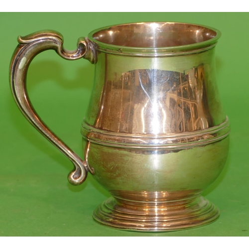 362 - A George VI Silver Pot Bellied Tankard having scroll handle engraved with inscription, Sheffield 193... 