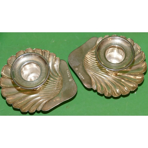 386 - A Pair of Victorian Silver Chamber Candlesticks on shell shaped bowls with bun feet, London 1886, ma... 