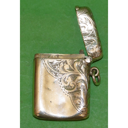 393 - An Edward VII Silver Vesta Case having part chased leaf and scroll decoration, hinge lid, Birmingham... 