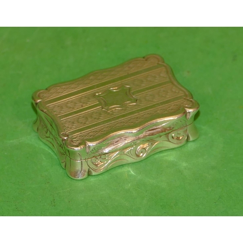 401 - A Victorian Silver Rectangular Scallop Shaped Vinaigrette having hinge lid enclosing inner pierced l... 