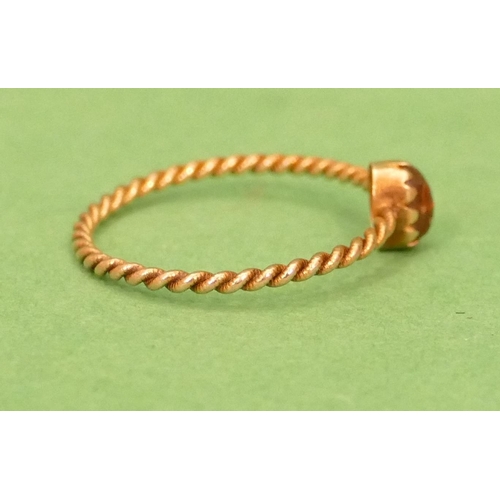 429 - A Small Gold Twist Ring set with red stone (stone chipped) size M/N.