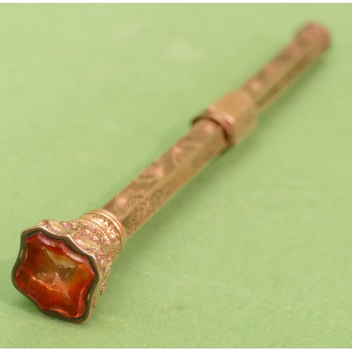 449 - A Gold Hexagonal Slide Action Propelling Pencil having engraved floral and scroll decoration, shaped... 