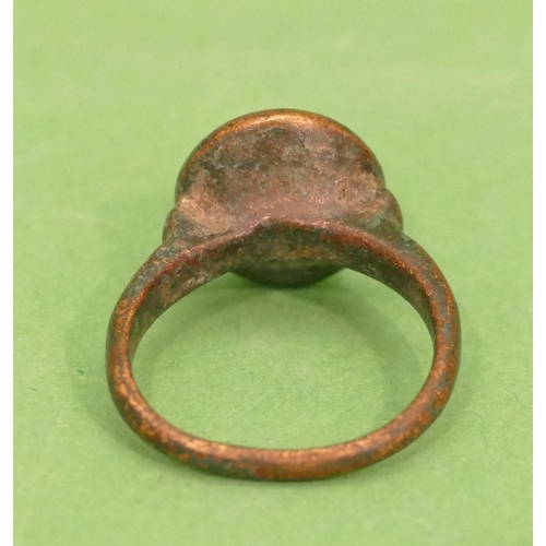 455 - A Roman Style Bronze Ring having animal motif, size P/Q.