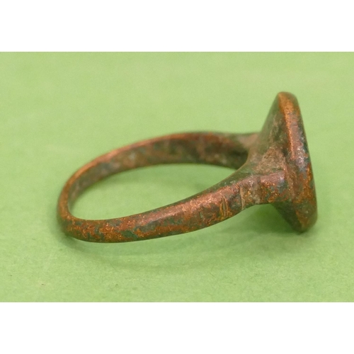 455 - A Roman Style Bronze Ring having animal motif, size P/Q.