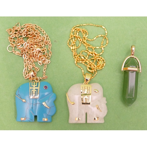 458 - A Turquoise Pendant in form of an elephant with chain, another similar pendant with chain and a jade... 