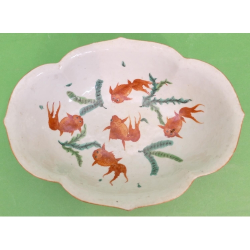 47 - A Jiaqing Chinese Oval Scallop Shaped Bowl having multicoloured fish, floral, leaf and branch decora... 