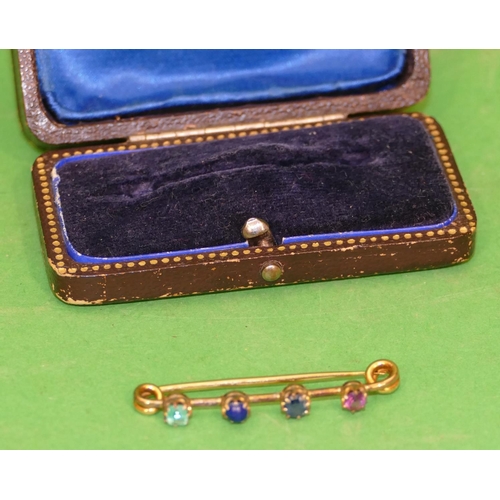 482 - A 15ct Gold Bar Brooch mounted with 4 different coloured stones, 3.3g gross, 4cm long, cased.