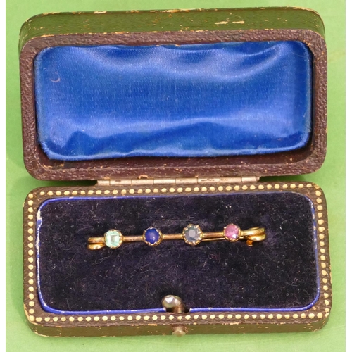 482 - A 15ct Gold Bar Brooch mounted with 4 different coloured stones, 3.3g gross, 4cm long, cased.