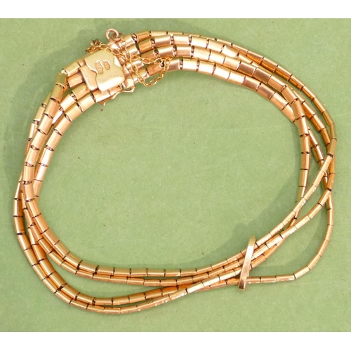 488 - An 18ct Gold 4 Strand Bracelet, 26.1g.