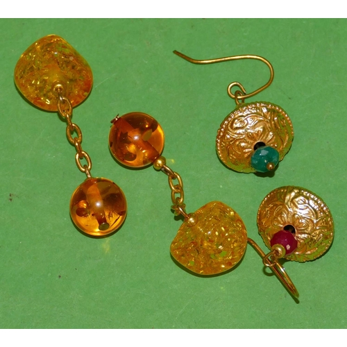 491 - A Pair of Modern Drop Earrings and a pair of amber cufflinks.