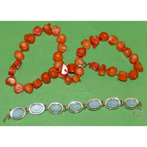 496 - A Coral Bead Necklace and a moonstone bracelet (2).