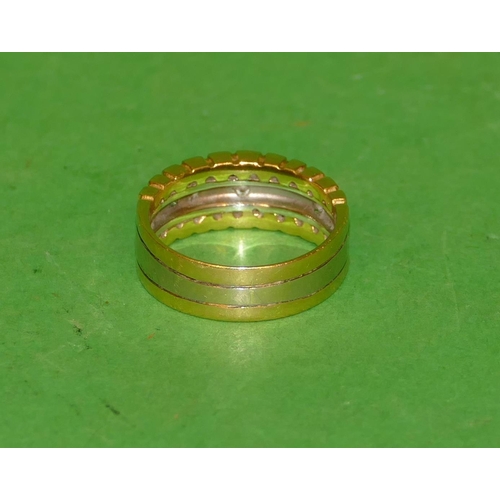 527 - An 18ct 2 Coloured Gold Ring set with 3 small diamonds, size O/P, 6.8g gross.