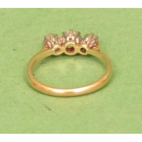 529 - An 18ct Gold Ladies 3 Stone Diamond Ring, centre diamond approximately 0.30ct, size L/M.