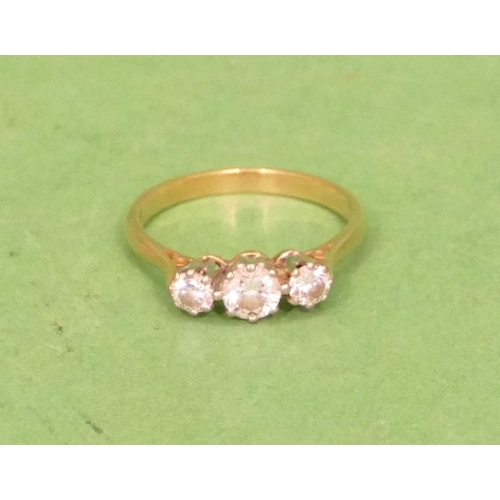 529 - An 18ct Gold Ladies 3 Stone Diamond Ring, centre diamond approximately 0.30ct, size L/M.