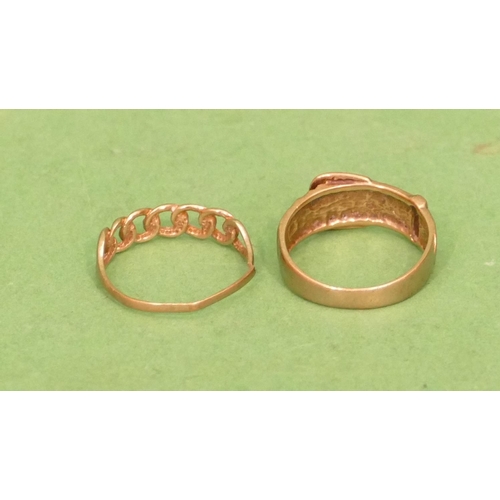 559 - A 9ct Gold Buckle Ring, size O/P and another gold ring, 3.9g (2).