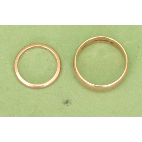 575 - A 9ct Gold Wedding Ring, size R/S and another small gold wedding ring size I/J, 8.2g (2).