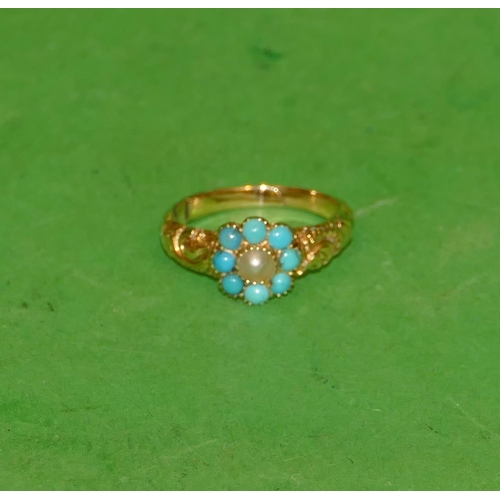 620 - A 19th Century Ladies Ring set with centre pearl surrounded by turquoise having scroll and leaf deco... 