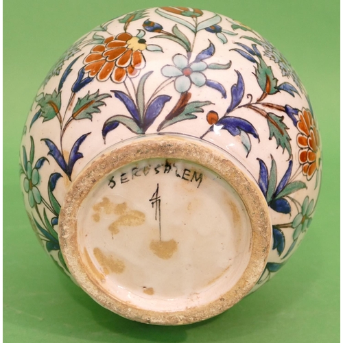 66 - A Jerusalem Round Bulbous Thin Necked Vase on white ground with multicoloured floral and leaf decora... 