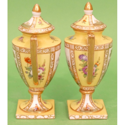 68 - A Pair of Dresden Round Bulbous 2 Handled Lidded Vases on yellow ground having multicoloured figure,... 