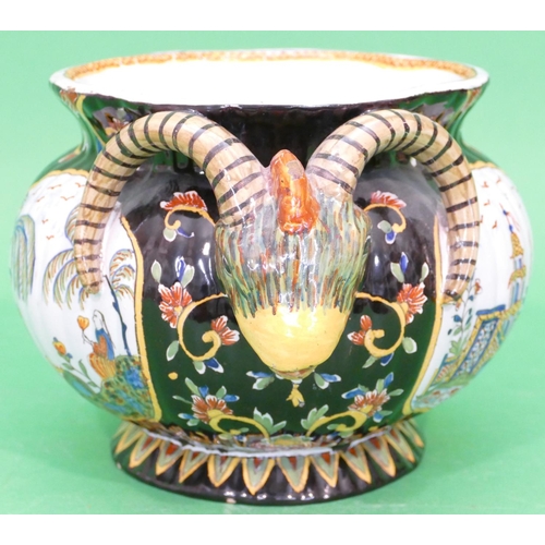 81 - A Continental Glazed Majolica Round Bulbous Thin Necked Trumpet Shaped Jardiniere having raised anim... 