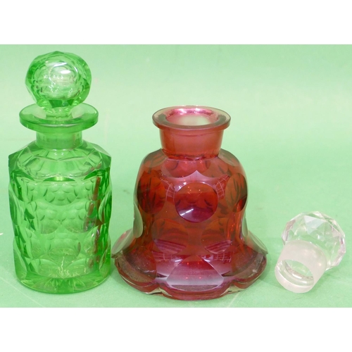 109 - A 19th century Ruby Glass Round Bulbous Thin Necked Bottle with clear stopper having all over thumb ... 